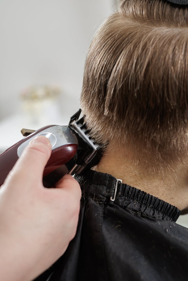 Close-up of haircut process